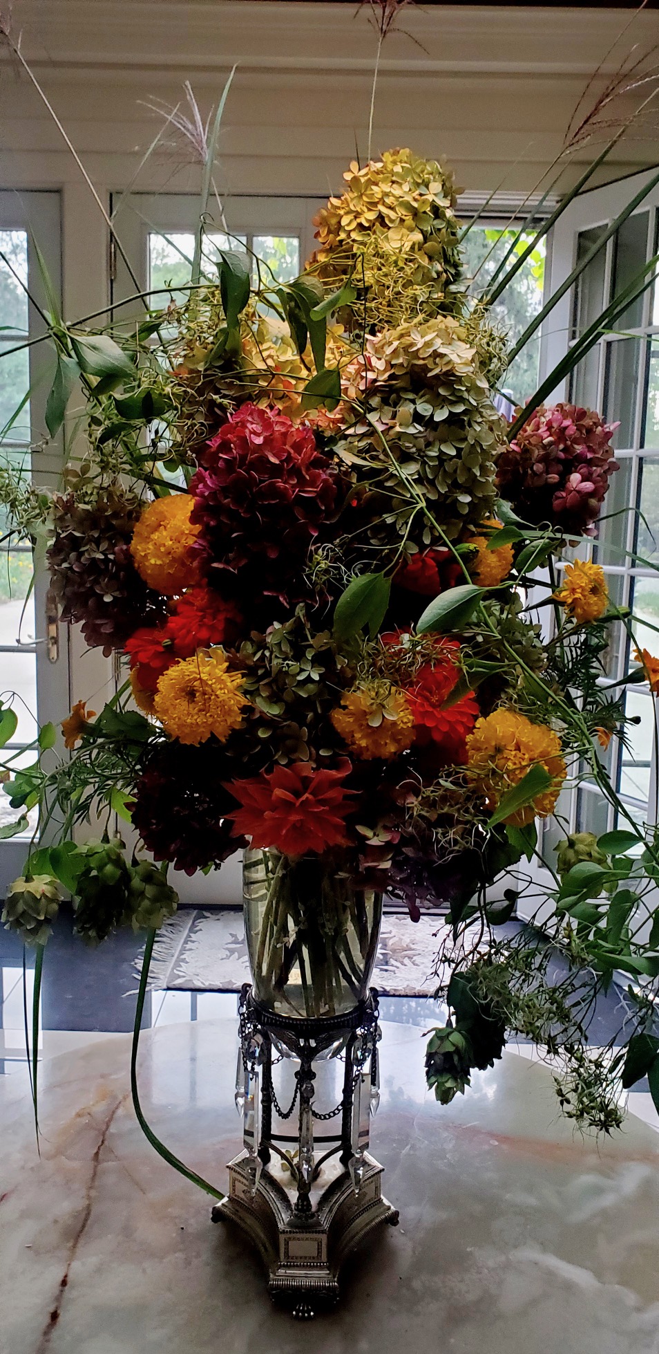 Multi-flower arrangement with grasses