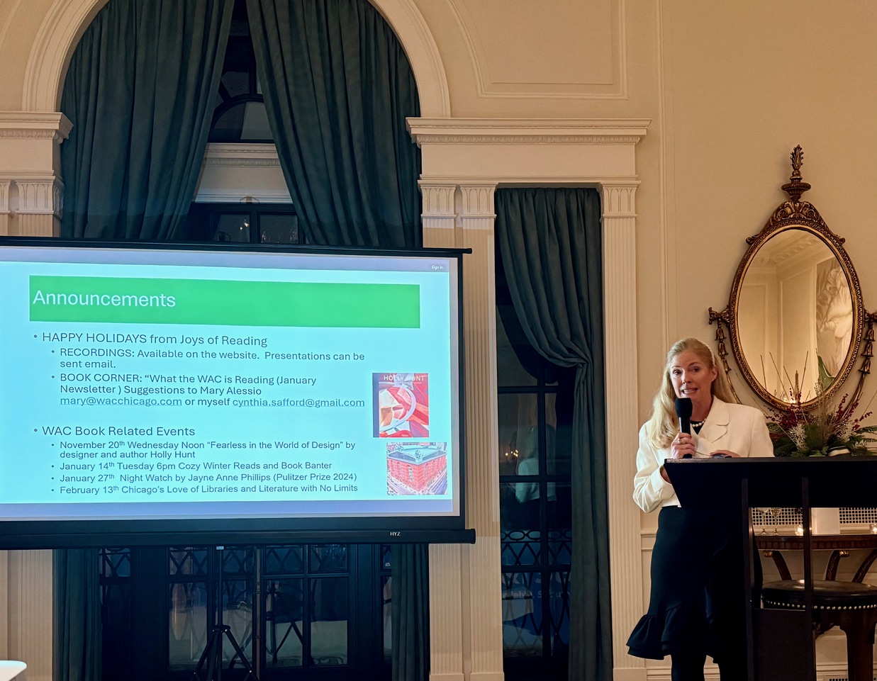 Cynthia Safford-Mulcahy presenting Joys of Reading announcements at the Woman's Athletic Club.