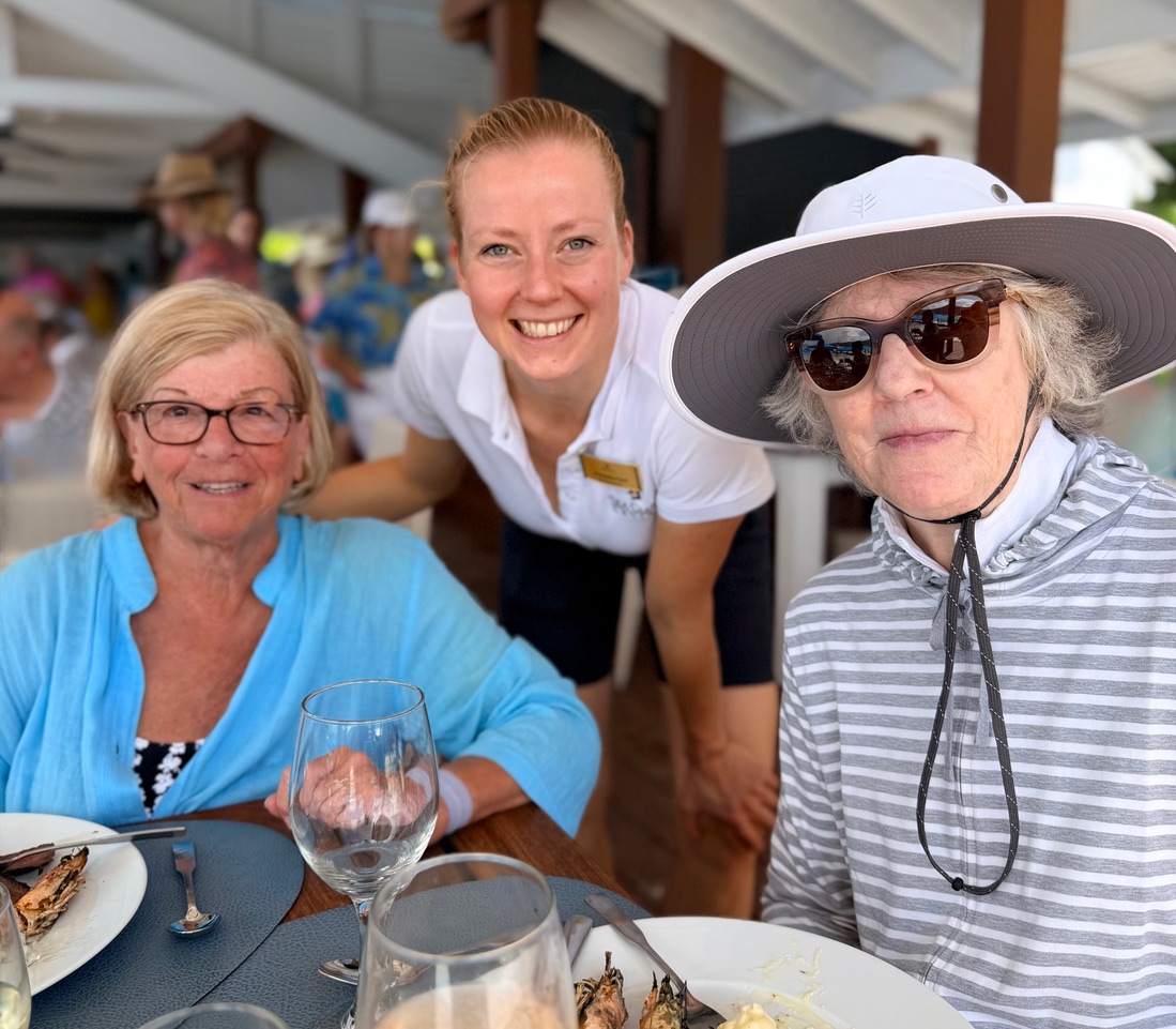 Keven and Adrienne enjoying lunch at a beachside restaurant.