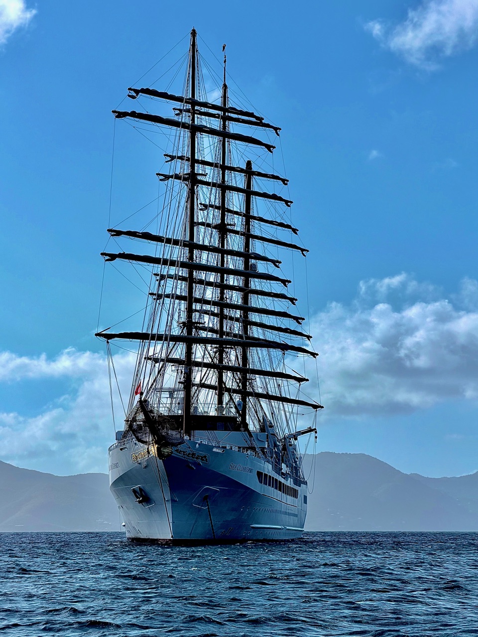 The Sea Cloud Spirit at anchor with sails furled.