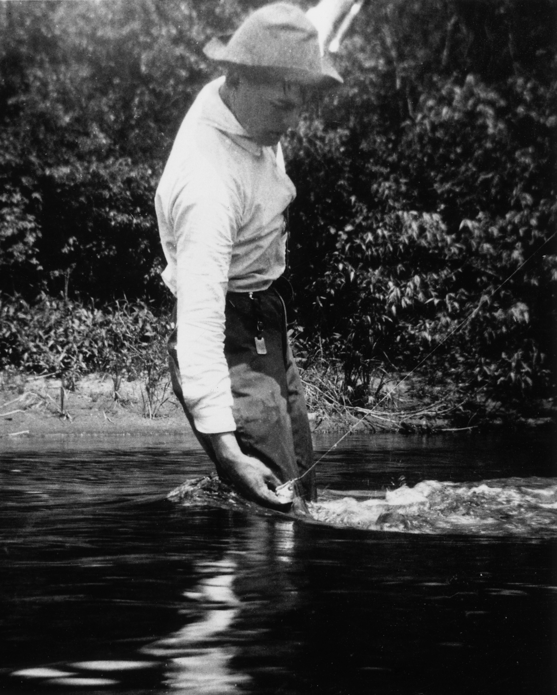 Ernest Hemingway fishing at Walloon Lake, Michigan, 1916