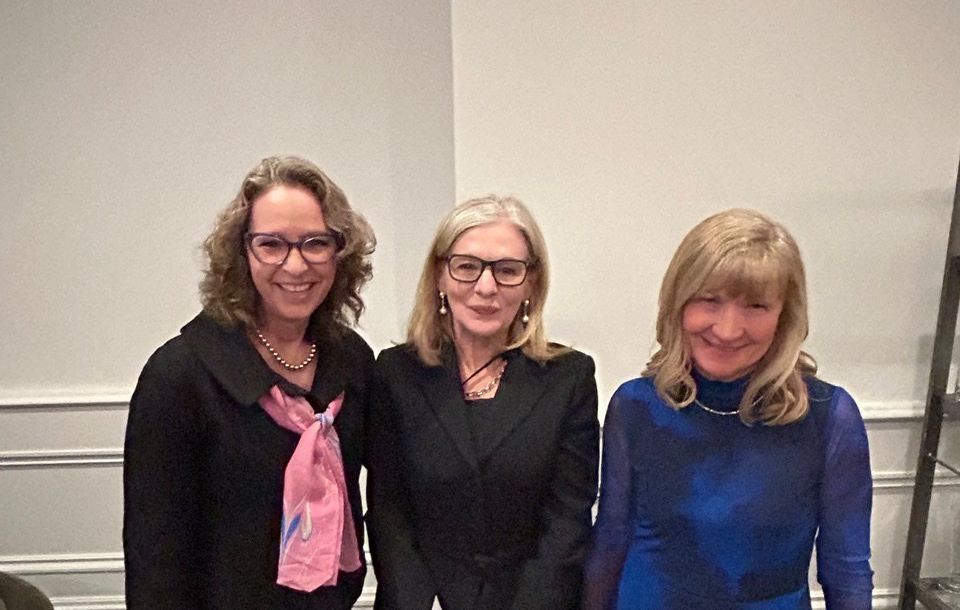 Peggy Parfenoff, Joyce Winnecke, and Emily Reynolds at the IWF event
