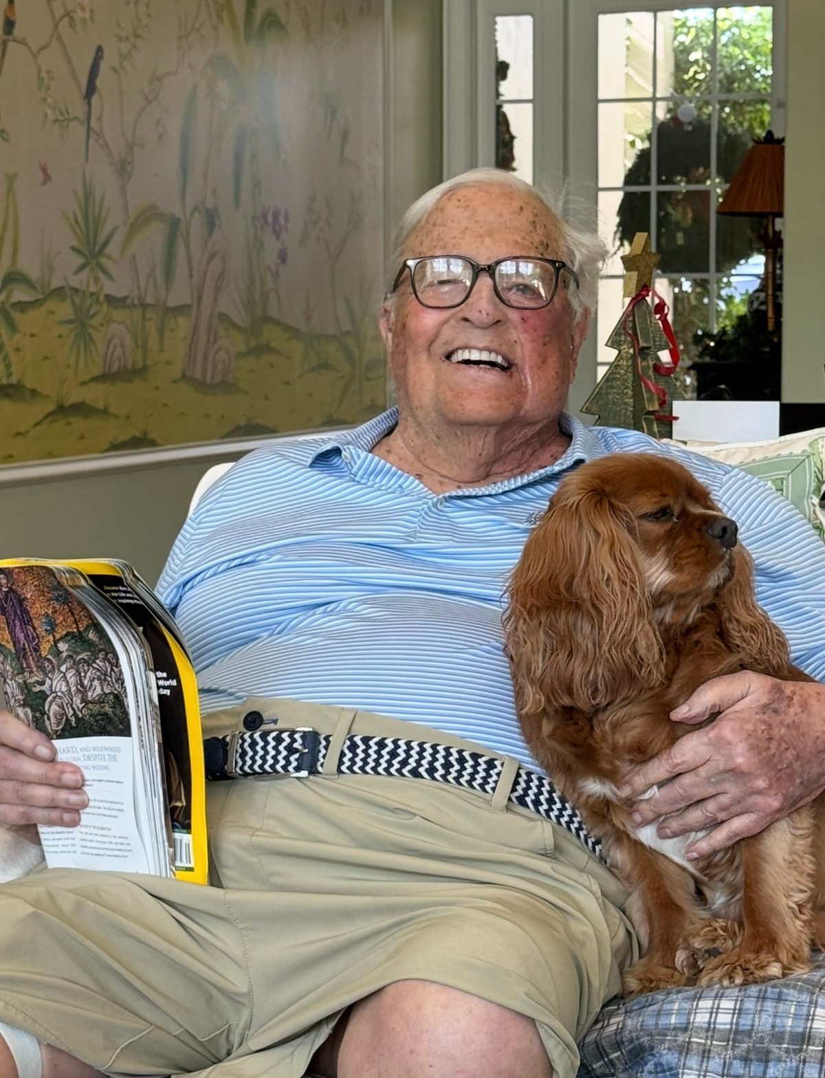 John Hendrick at home with the family dog