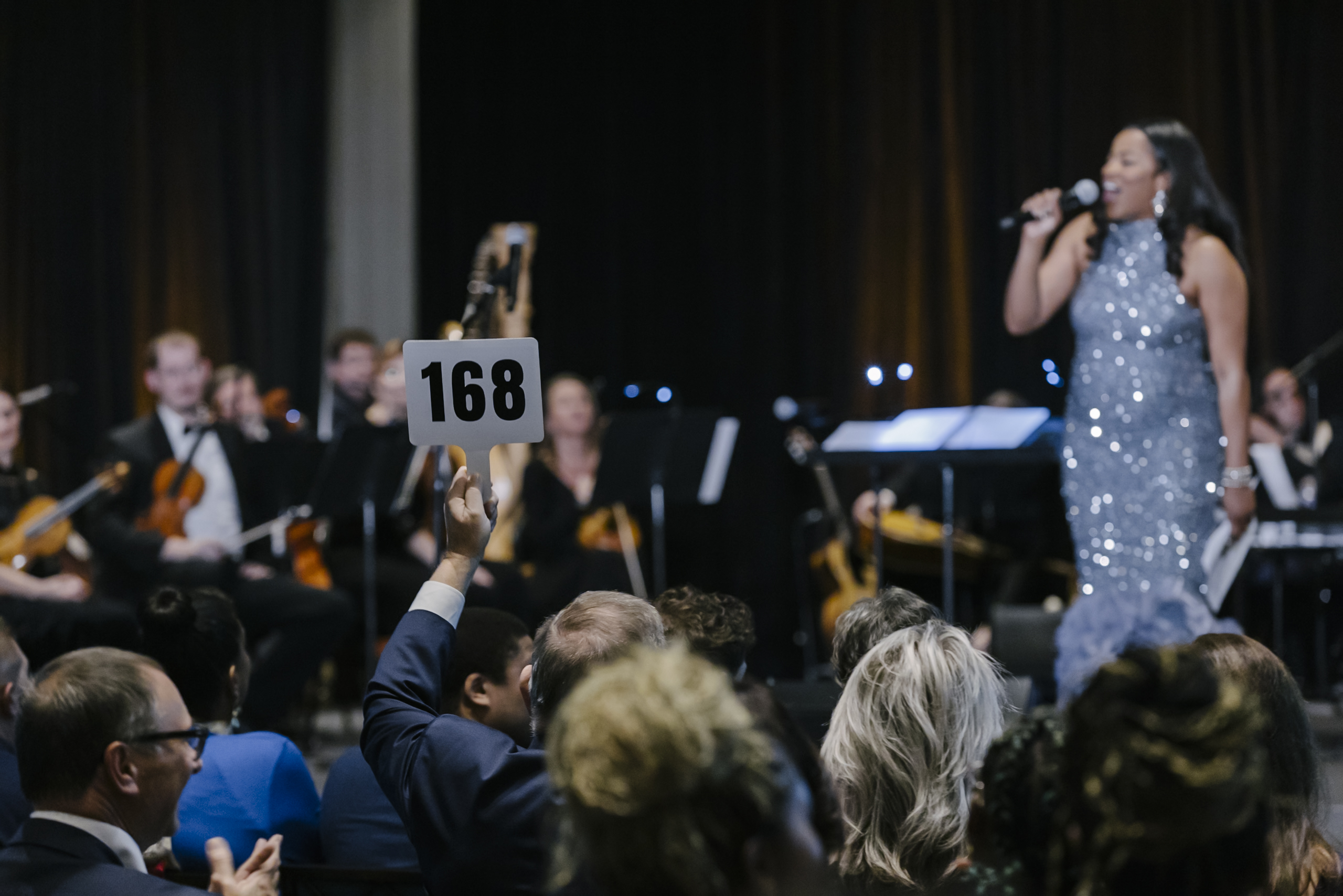 Chadaé Nichol presides over the paddle raise