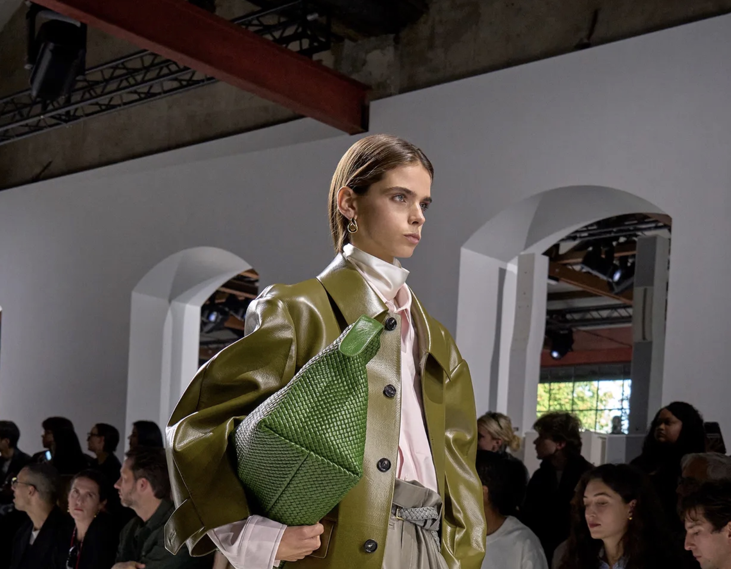 Spring layering — green leather jacket over pink shirt