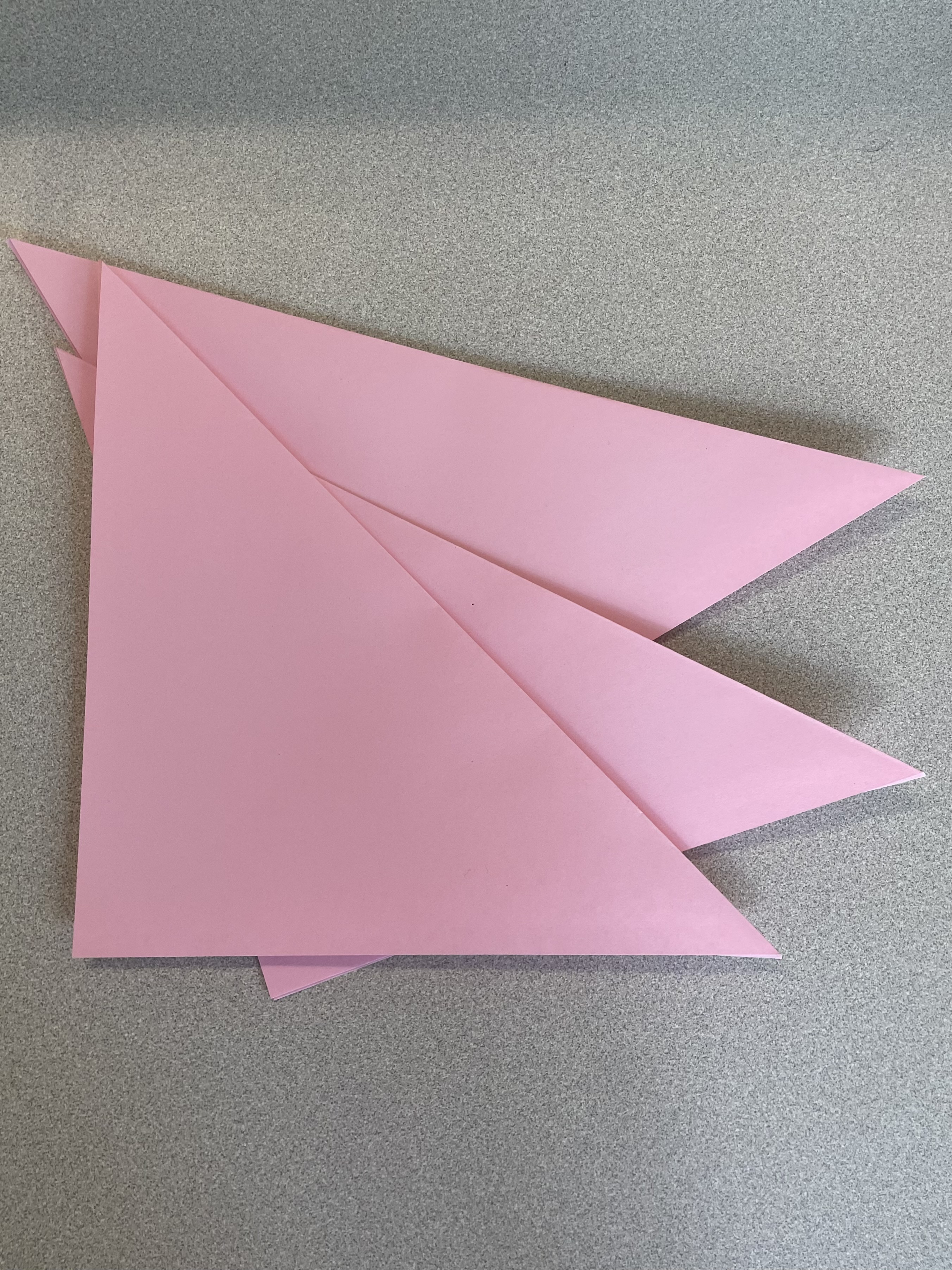 Cutting squares from A4 paper — pink triangle method
