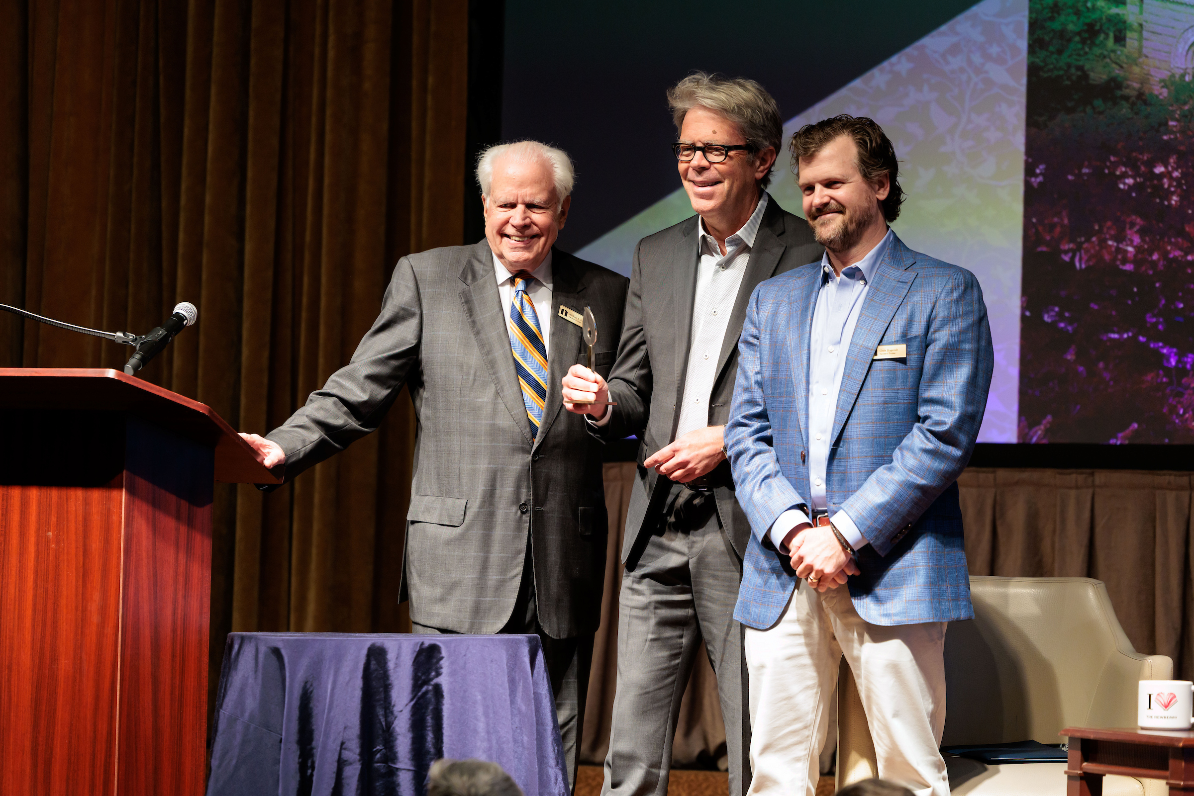 From left, Newberry Trustee Michael Pope, Jonathan Franzen, and Newberry Trustee Christopher Hagenah