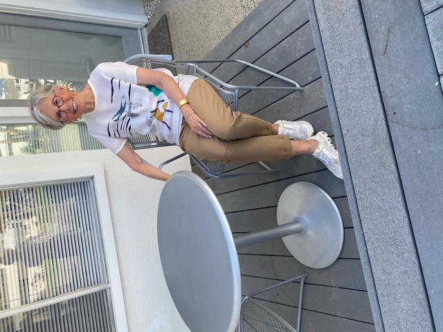 Tracy relaxing outside her home after a long walk