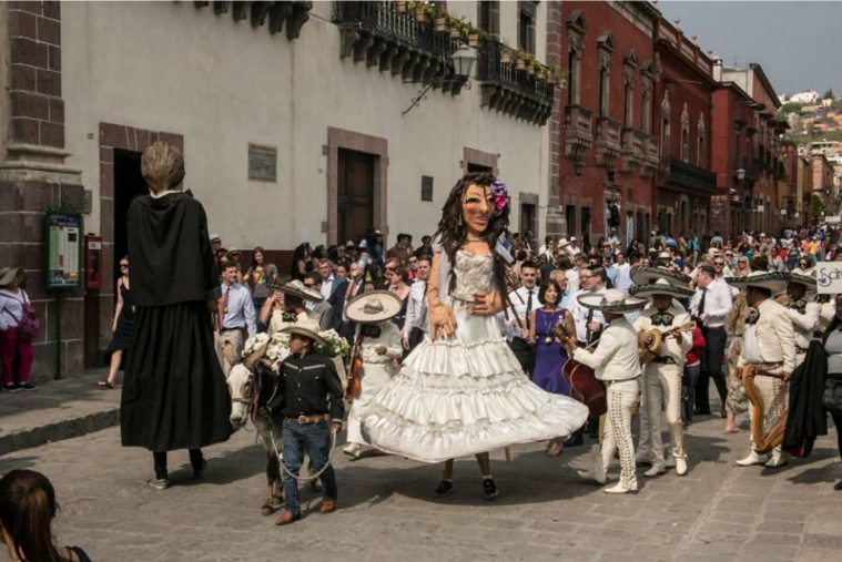 Mojigangas at a wedding parade