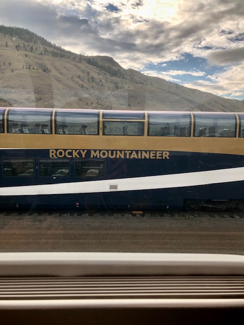 The Rocky Mountaineer dome car train arriving in Banff