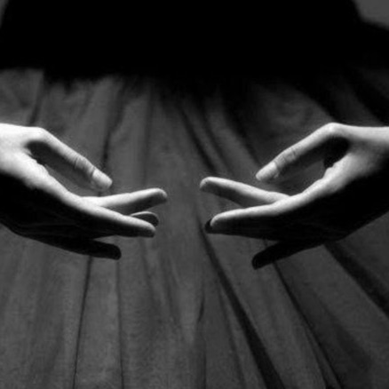 A ballet dancer's hands in an expressive gesture