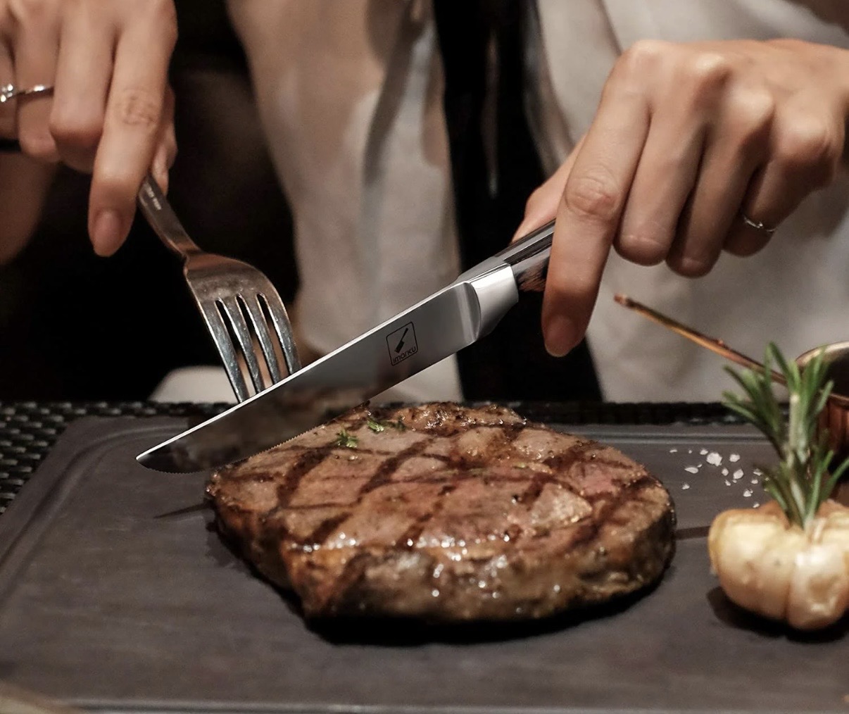Hands at a dinner table