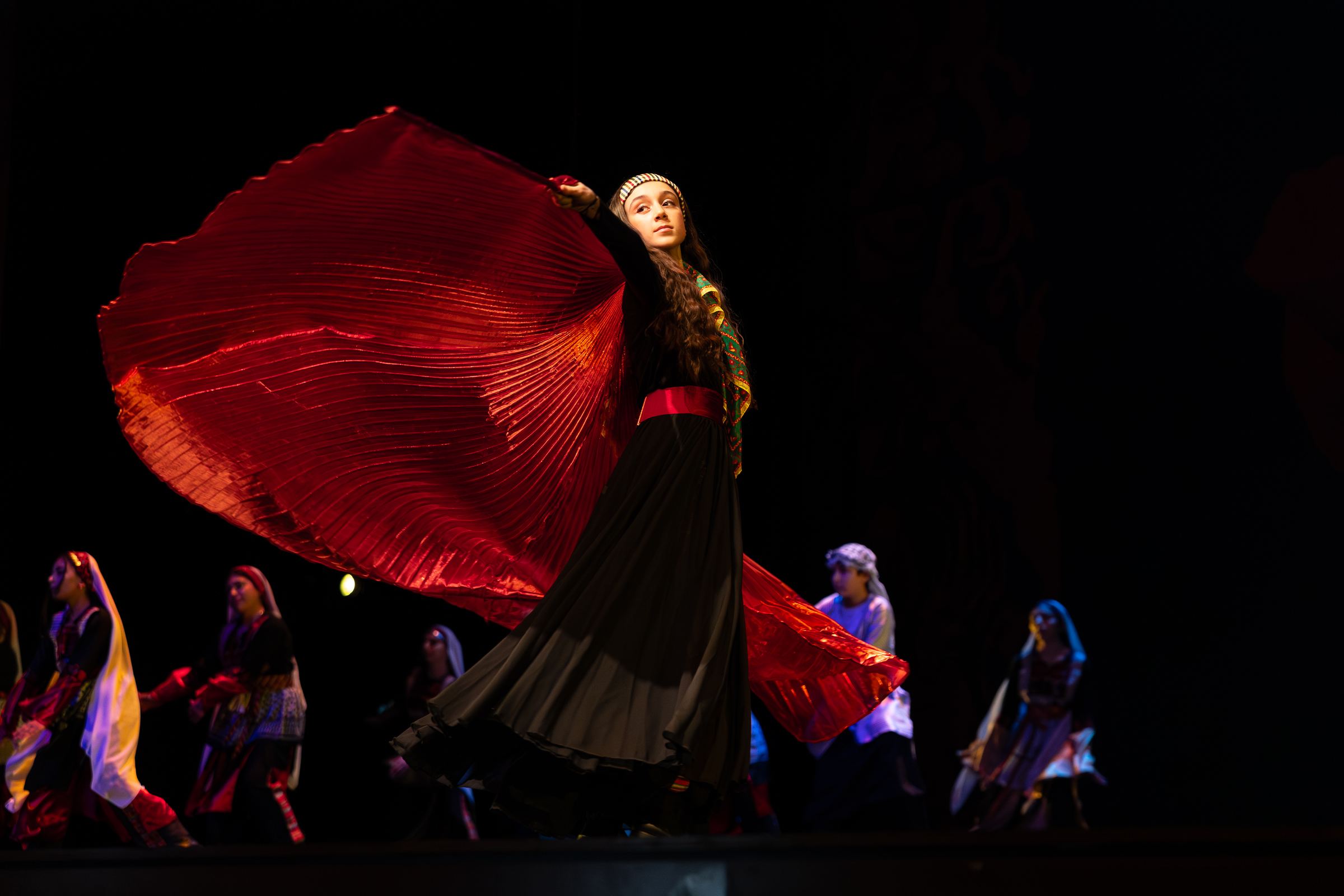 A Canaan Wellspring dancer performing on stage