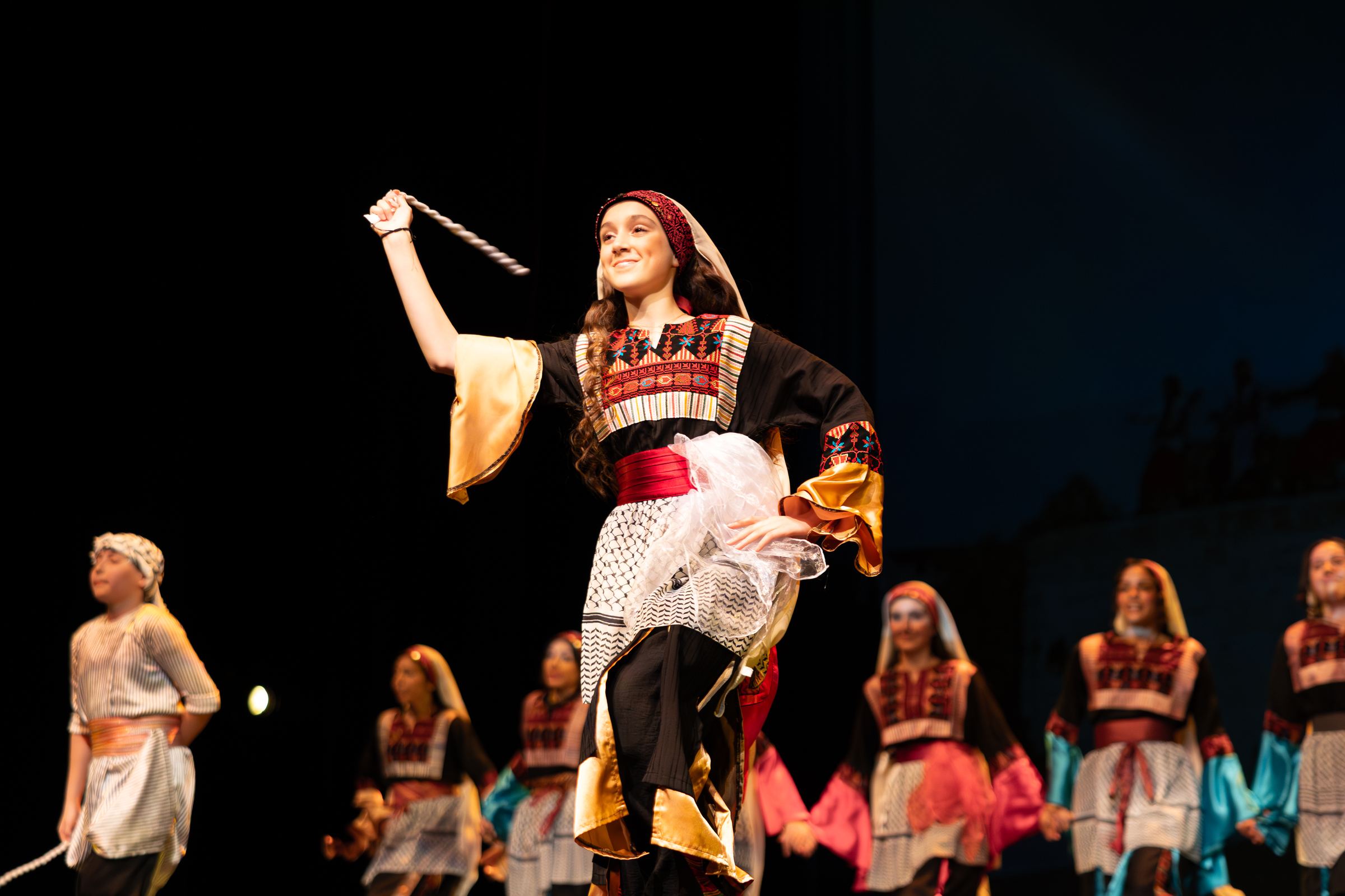A Canaan Wellspring dancer performing on stage