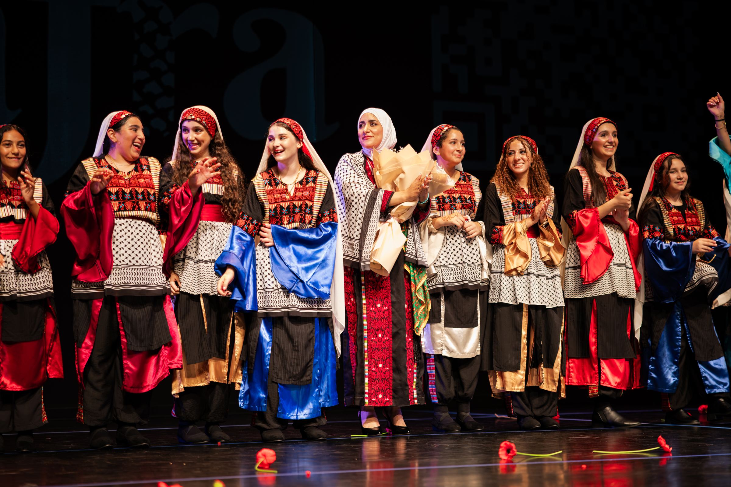 The full Canaan Wellspring troupe on stage