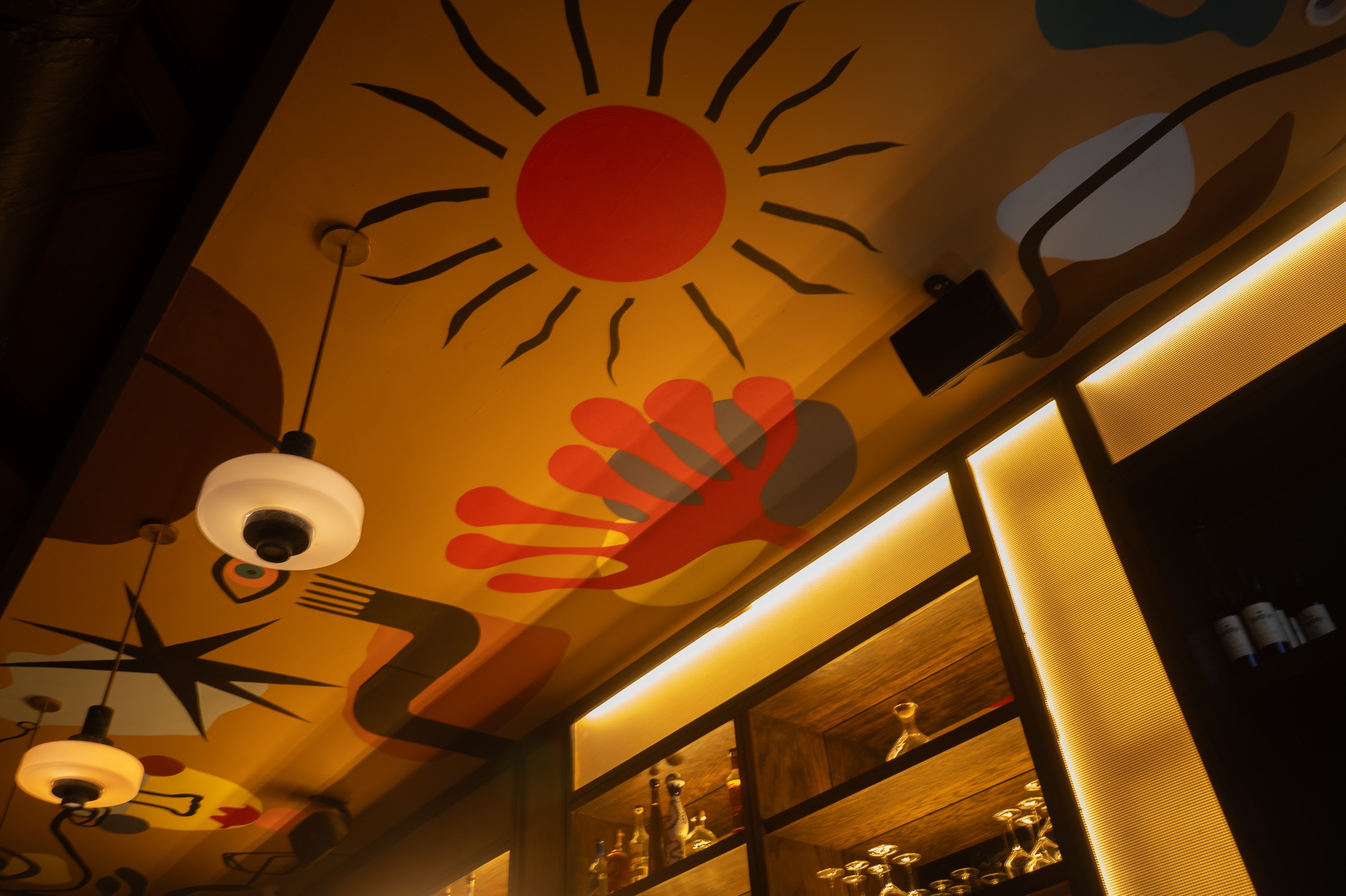 Raspy Rivera In collaboration with CoCo Schramel A view of bar ceiling mural at “Trino” steakhouse. Chicago. Photo: Leo Bommarito